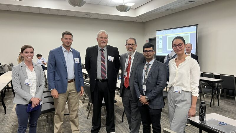 Joshit Mohanty with team after federal Department of Defense presentation